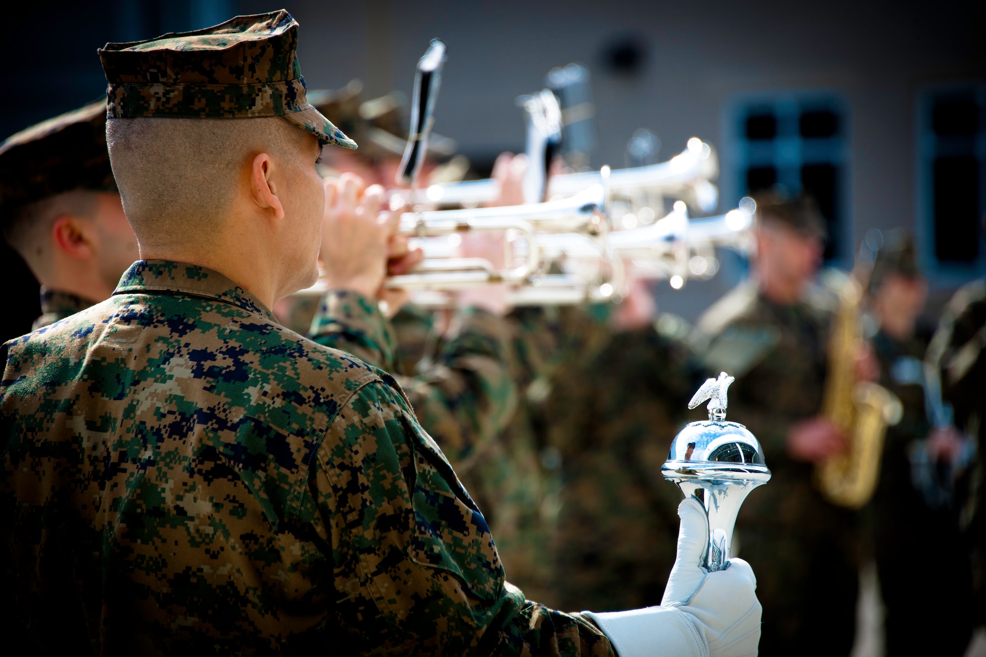 Drum Major Gunnery Sgt. Victor Miranda stands by the 2nd Marine Aircraft Wing Band during the Marine Fighter Attack Training Squadron 501 change of command ceremony Feb. 3 at Eglin Air Force Base, Fla.  The band is headquartered at Marine Corps Air Station Cherry Point, N.C. (U.S. Air Force photo/Samuel King Jr.)