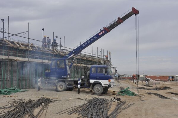 Workers continue vertical construction at the 9th Commando Kandak project near Herat, Afghanistan. The U.S. Army Corps of Engineers Afghanistan Engineering District-South is building a base that will provide Afghan commandos with housing, dining, office and other facilities.