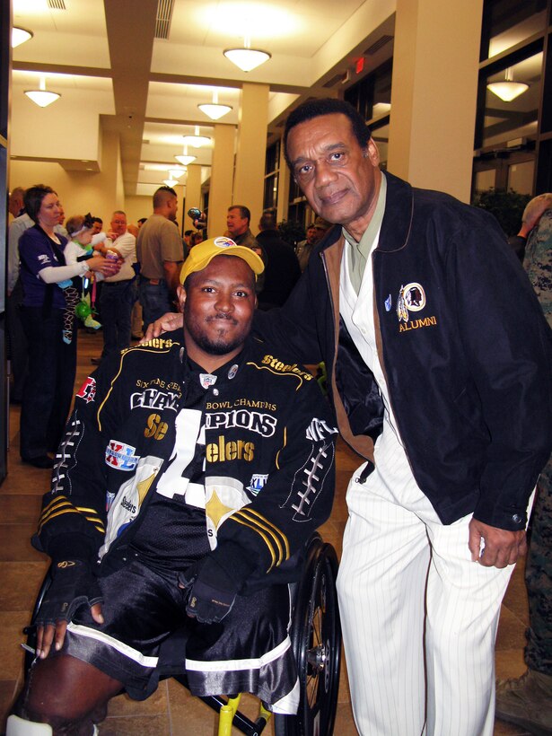 Army Sgt. Kevin Gaton, a 101st Airborne Division soldier who lost his leg
following an attack in Afghanistan in July 2010, poses with Roy Jefferson, a former wide receiver for the Washington Redskins, during the Super Bowl
party for wounded warriors at Walter Reed National Military Medical Center in Bethesda, Md., Feb. 5, 2012.