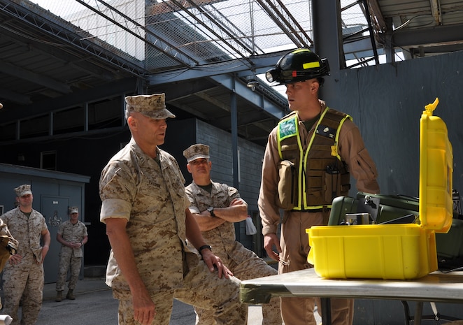 STUMP NECK ANNEX, Md. (April 6, 2011) Lt.Gen. John Paxton Jr., Commanding General for II Marine Expeditionary Force (l.), is briefed on the equipment used by CBIRF's Incident Response Teams to conduct downrange sampling and processing.