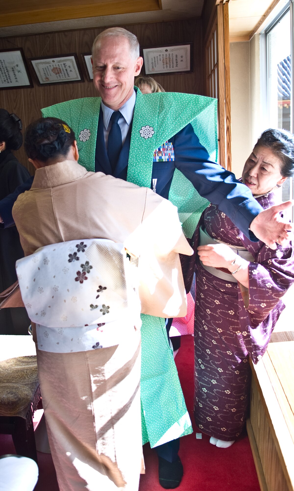 HINO CITY, Japan -- Col. Otto Feather, 374th Airlift Wing commander, is dressed in a "Kamishimo" prior to participating in the annual Bean Throwing Ceremony at the Takahata Fudo Temple in Hino City, Japan, Feb. 3, 2012. A "Kamishimo" is a formal piece of clothing worn by a samurai or Japanese warrior. (U.S. Air Force photo/Airman 1st Class Krystal M. Garrett)  
