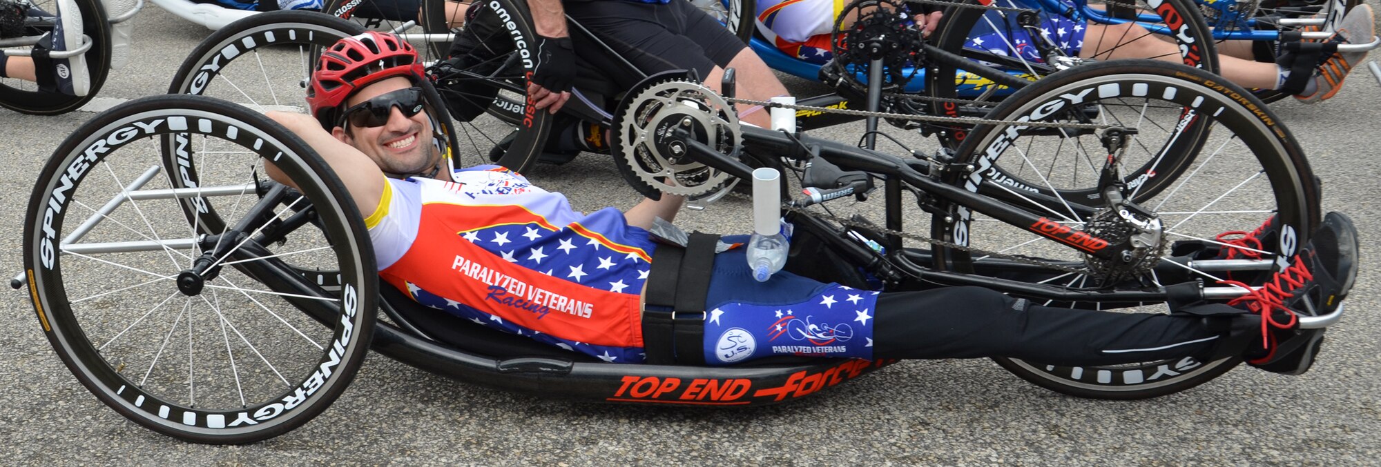 A paralyzed military veteran gets ready for the start of the hand-cycle half-marathon race as part of the Melbourne & Beaches Music Marathon near Patrick Air Force Base, Fla., Feb. 5. Col. Jeff Macrander, 920th Rescue Wing commander, PAFB, was the event's officiant, while Tech. Sgt. Jennifer Fiore, the anthem songstress. Many 920th Airmen participated in the weekend health and fitness event. (U.S. Air Force photo/Natasha Dowridge)