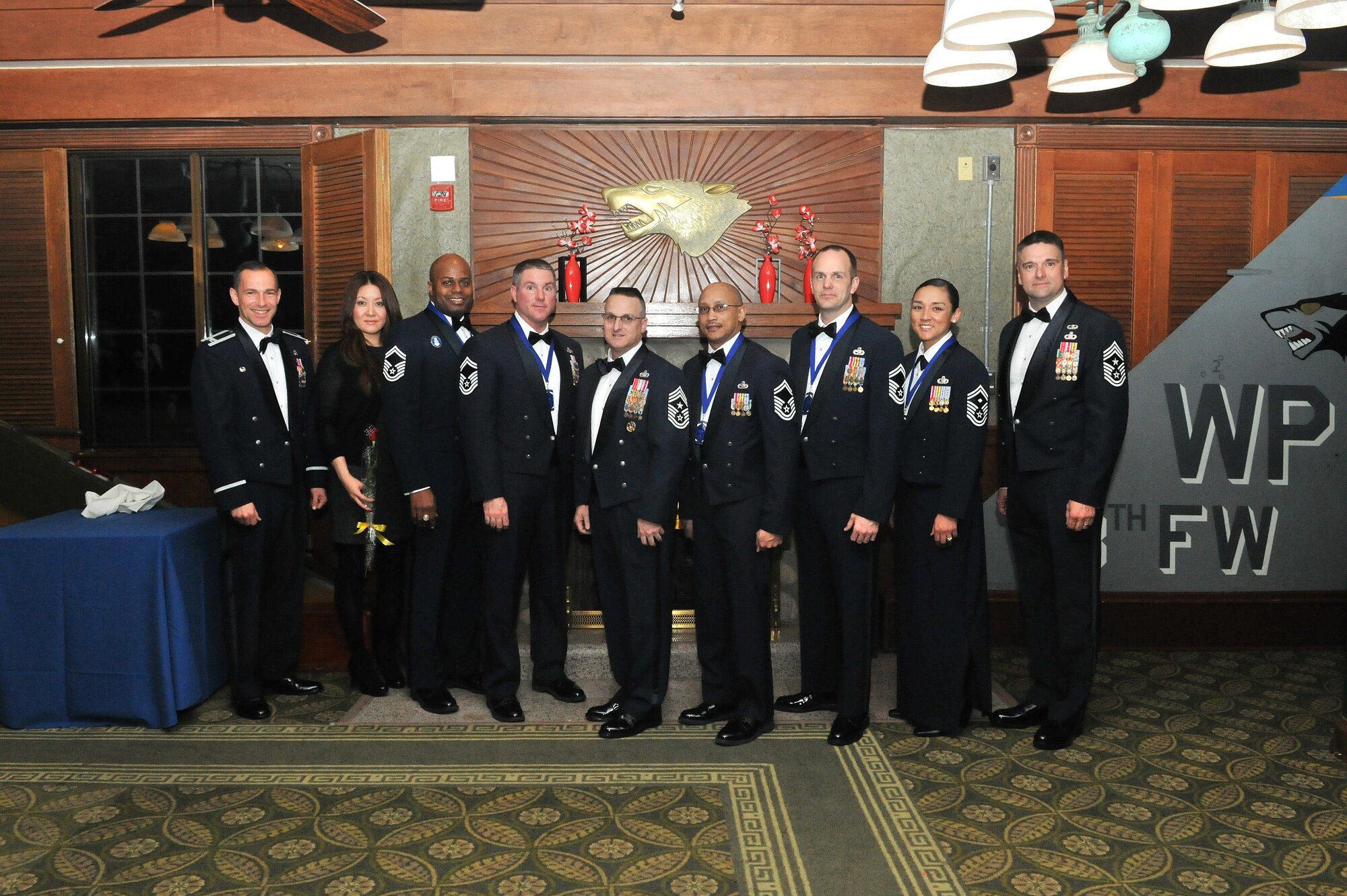 Chief master sergeant selectees pose for a group photo during their Chief Induction Ceremony at Kunsan Air Base, Republic of Korea, Jan. 27, 2012. Five active duty Airmen were inducted into the highest enlisted rank during the formal event. (U.S. Air Force photo by Senior Airman Brittany Y. Auld/Released)