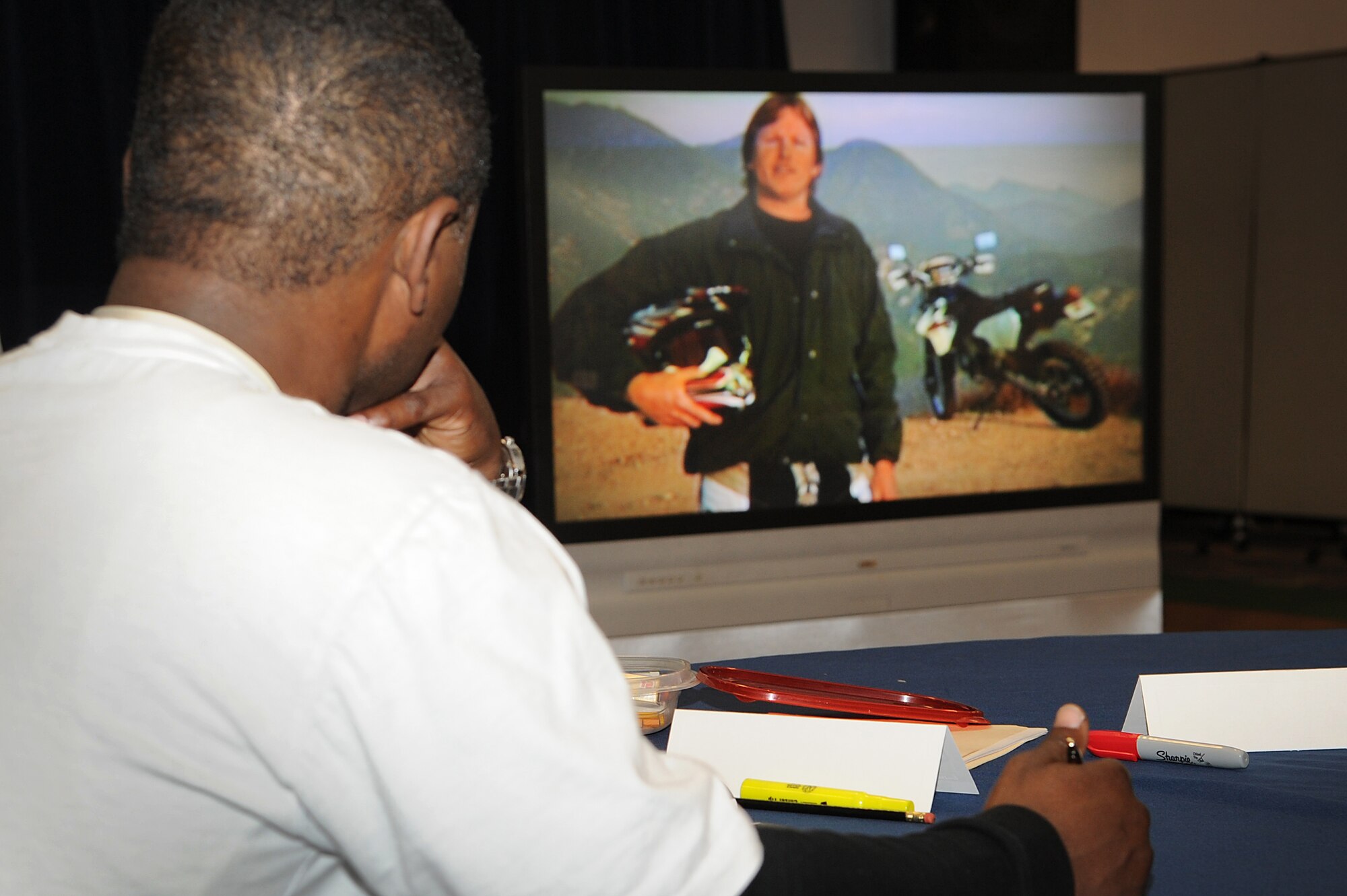 U.S. Air Force Staff Sgt. Chris Pegram, 27th Special Operations Component Maintenance Squadron, watches a motorcycle safety video at the Landing Zone at Cannon Air Force Base, N.M., Feb. 2, 2012. The safety course training is required by Air Force Instruction for all active duty personnel who ride a motorcycle on or off duty. (U.S. Air Force photo by Airman 1st Class Xavier Lockley) 