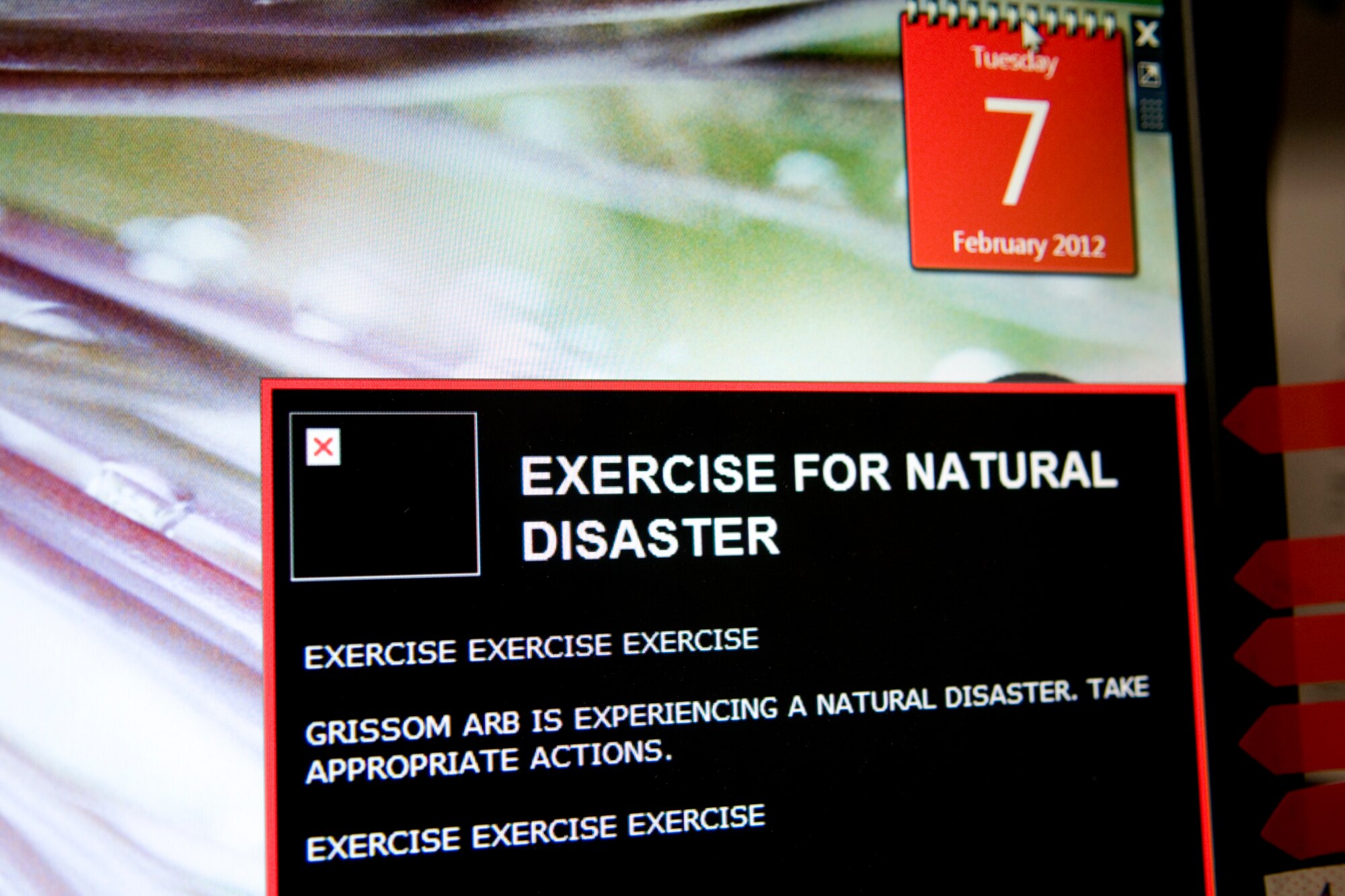GRISSOM AIR RESERVE BASE, Ind. -- A mass notification system message notifying Grissom personnel about a simulated earthquake is seen displayed on an Airman's computer. Grissom personnel dropped, covered and held on during a Great Central U.S. ShakeOut earthquake drill along with millions of other Americans. (U.S. Air Force photo/Tech. Sgt. Mark R. W. Orders-Woempner)
