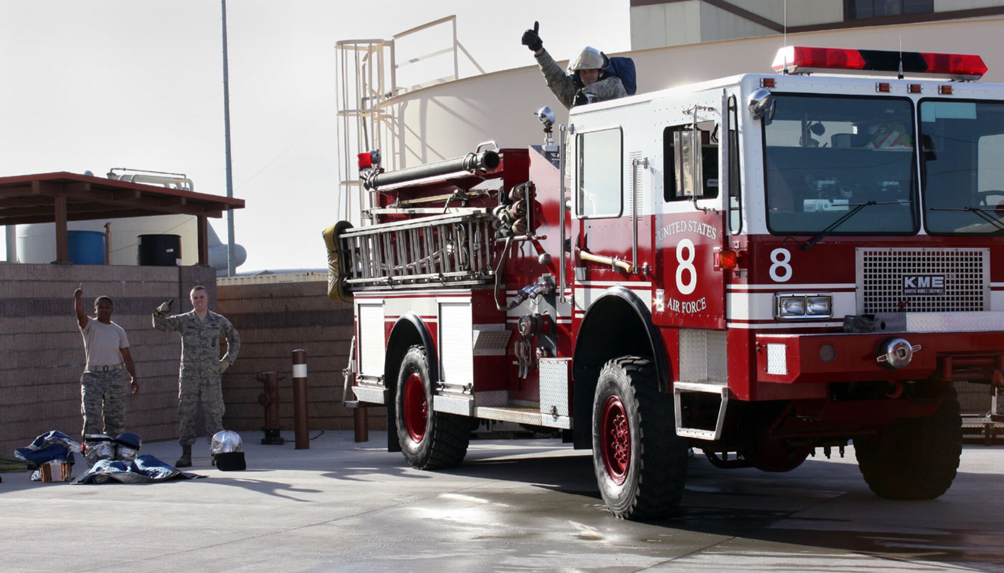 Airmen from the 349th Civil Engineer Squadron Fire Department give the thumbs-up, indicating they are ready to begin a training exercise here Jan. 8.The Reserve Airmen conducted joint training with their active-duty counterparts from the 60th
Civil Engineer Squadron over the weekend. (U.S. Air Force photo/Tech. Sgt. Rachel Martinez)
