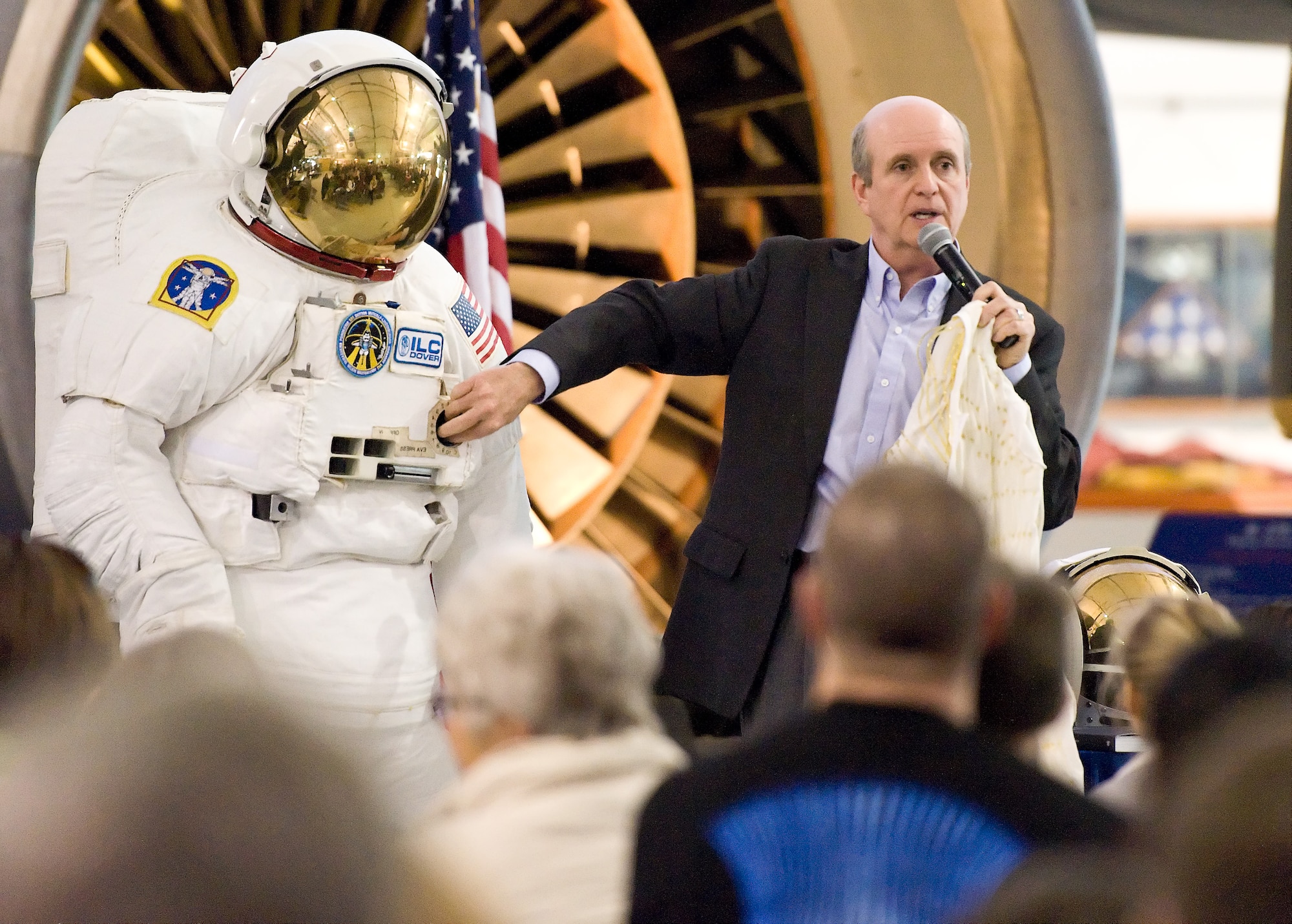 Bill Ayrey of ILC-Dover presents a spacesuit as part of a program titled “Hangar Flying” Feb. 5, 2012, at the Air Mobility Command Museum in Dover, Del. Hangar Flying is a series of educational presentations relating to the United States Armed Forces. (U.S. Air Force photo by Roland Balik)