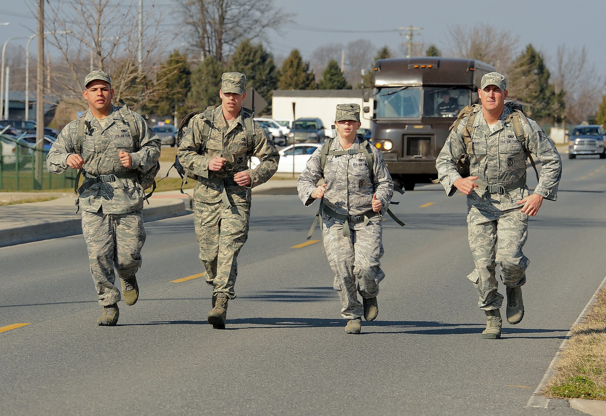 Ravens with the 436th Security Forces Squadron train for an upcoming ruckmarch Feb. 3, 2012, at Dover Air Force Base, Del. Many runners begin training months before the 6.2-mile run. (U.S. Air Force photo by Master Sgt. Jeanette Spain)  