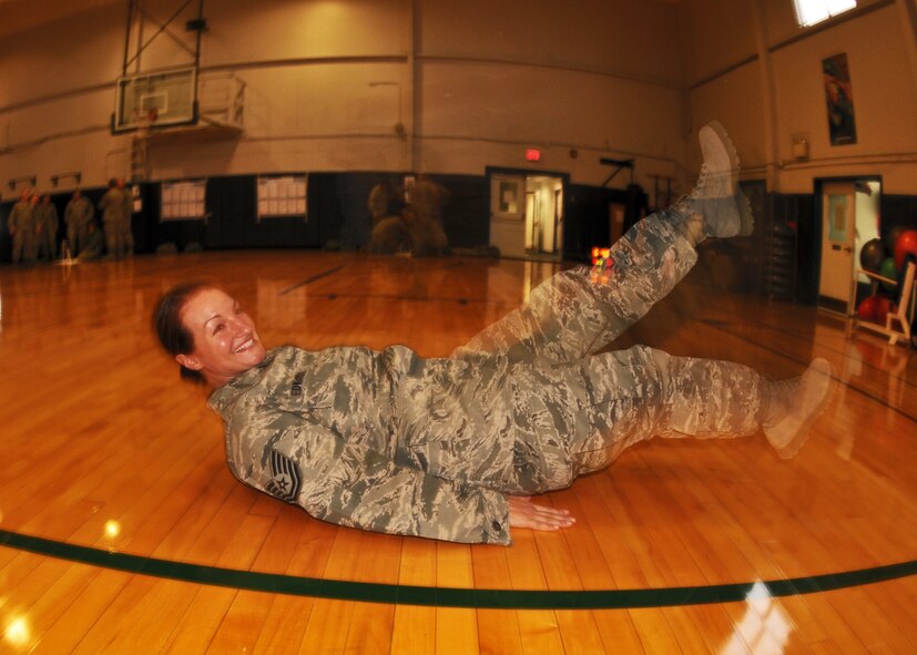 914th Airlift Wing Tech Sgt. Charity Edwards engages in a Wingman Day activity at the base fitness center February 5, 2012 Niagara Falls Air Reserve Station, NY. This exercise combined both physical and mental abilities it was the fourth and last pillar in the 914th Airlift Wing’s Wingman Day. (U.S. Air Force photo by Tech Sgt. Joseph McKee)