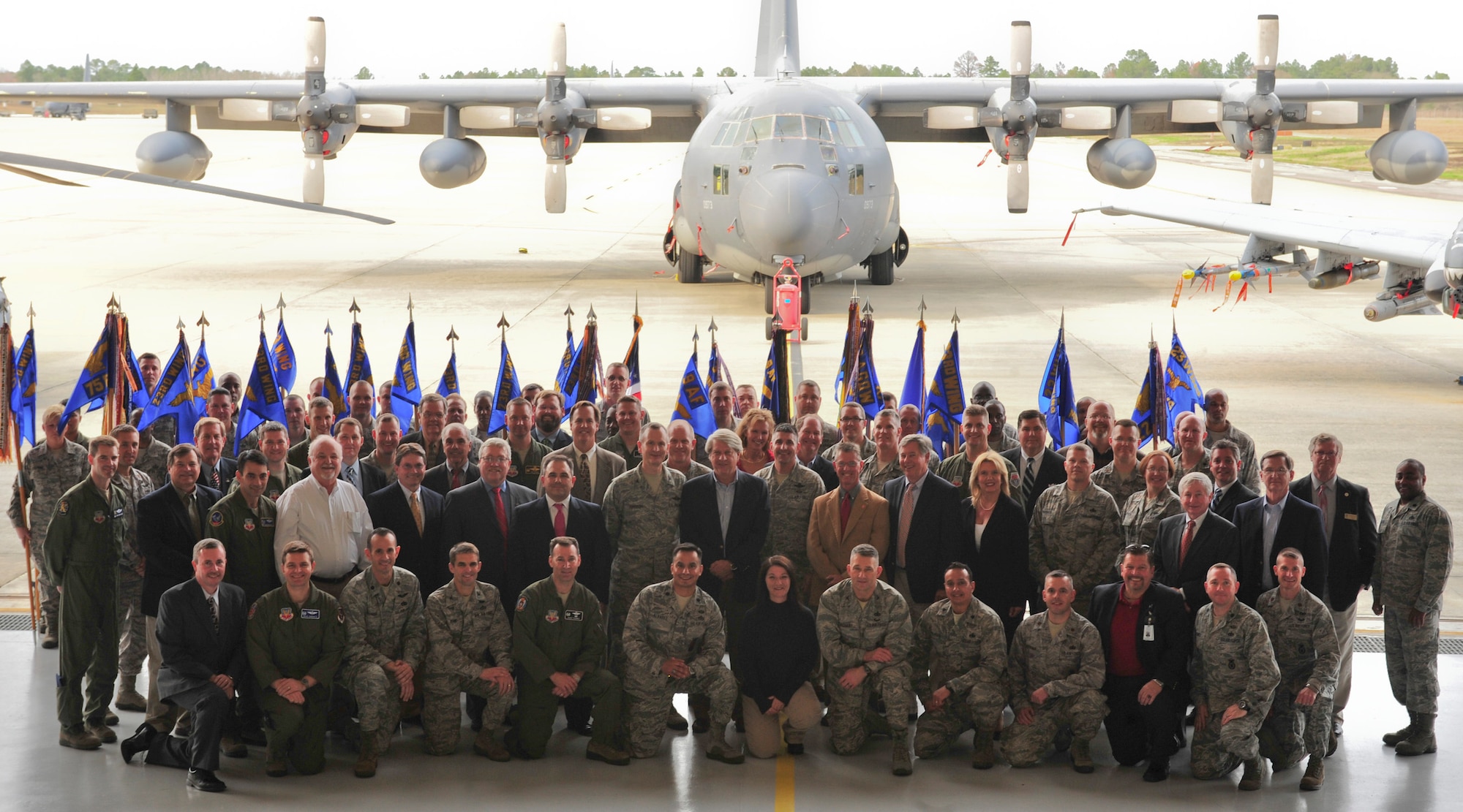 Team Moody’s wing, group and squadron commanders along with each honorary commander gather for a group photo after the Honorary Commander Change of Command Ceremony at Moody Air Force Base, Ga., Feb. 3, 2012. The honorary commander program pairs community leaders with various Moody commanders to educate them about the Air Force and the installation.  (U.S. Air Force photo by Staff Sgt. Stephanie Mancha/Released)