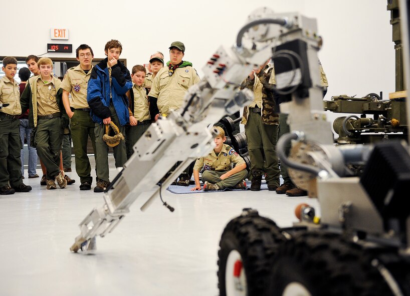 Boy Scouts from Troop 51 out of Forsyth, Ga., watch a demonstration of the Remote Ordnance Neutralization System robot at the 116th Civil Engineering Squadron explosive ordnance unit (EOD), Robins Air Force Base, Ga., Jan. 22, 2012.  The scouts were given a tour of the EOD unit during a field trip to Robins Air Force Base. (National Guard photo by Master Sgt. Roger Parsons/Released)