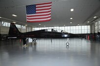 A T-38 Talon aircraft from Beale Air Force Base is the 100th on time production aircraft delivered at Joint Base San Antonio-Randolph Feb. 6. The T-38 was modified by the 571st Aircraft Maintenance Squadron Operating Location A here at JBSA-Randolph.(U.S. Air Force photo/Rich McFadden) (released) (U.S. Air Force photo/) (released)