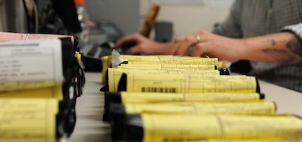 Glasses sit in their cases waiting to be picked up by the customers at the 628th Medical Group Optometry Clinic Jan. 31 at Joint Base Charleston Air-Base. Both the Air Base and the Weapons Station’s clinics provide eye care to active duty service members and Reservists on special orders. The most common services provided are eye examinations, visual acuity checks, repairing glasses, color vision test and comprehensive exams. (U.S. Air Force photo/Airman 1st Class Ashlee Galloway)