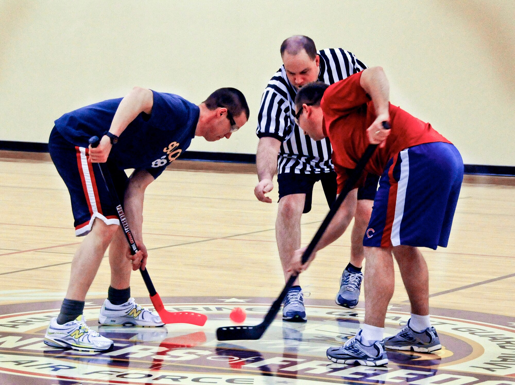 Security Forces, Logistics Readiness and the Communications Squadrons take it to the “ice” in games of floor hockey at the fitness center Minneapolis Air Reserve Station. (Air Force Photo/Tech Sgt. Bob Sommer)