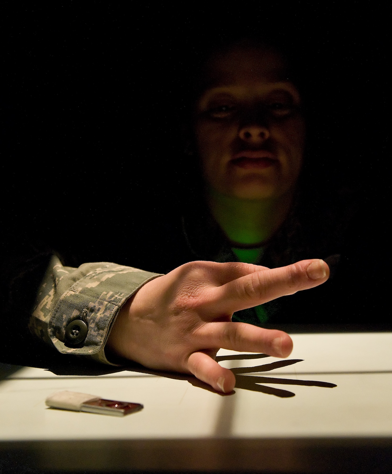 Master Sgt. Tina Birch, diagnostic imaging flight chief with the 436th Medical Support Squadron, receives an X-ray on her finger Feb. 2, 2012, at Dover Air Force Base, Del. Birch is responsible for the radiology department at the medical clinic, as well as imaging support for Air Force Mortuary Affairs Operations Center. (U.S. Air Force photo by Roland Balik)