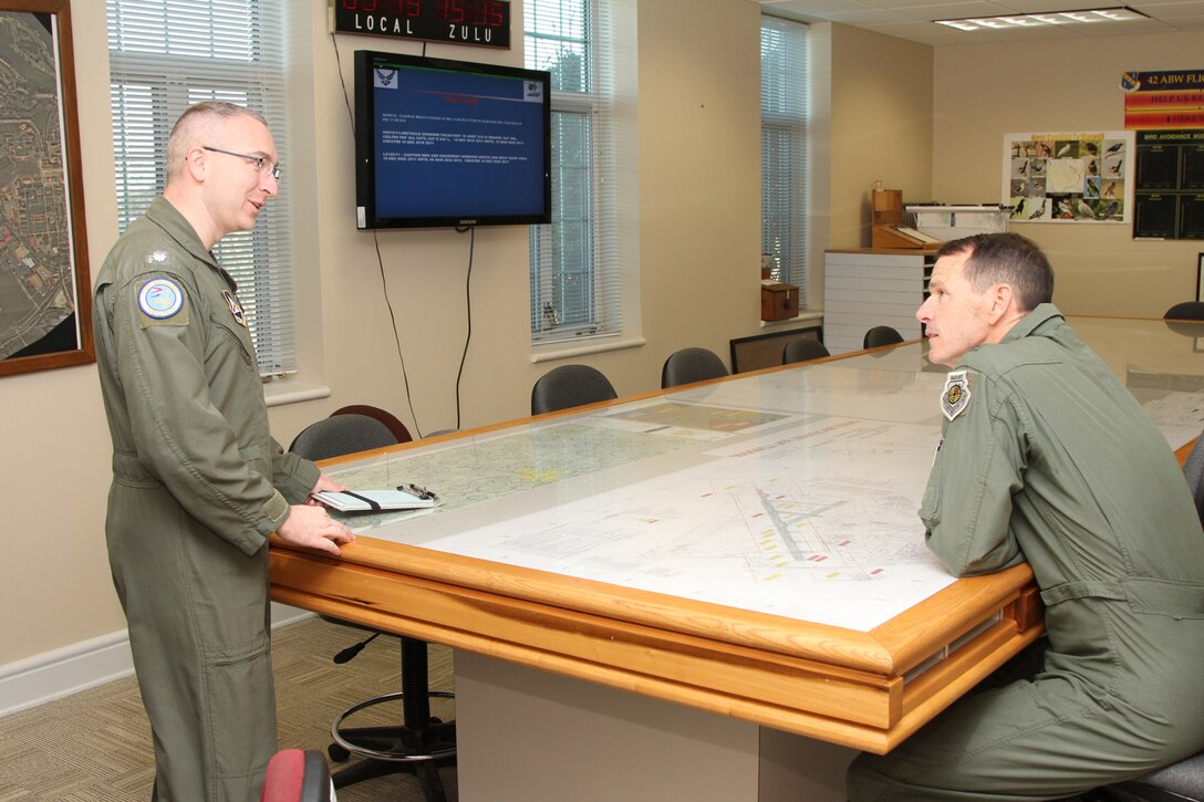 Civil Air Patrol Lt. Col. Chad Grondahl, director of operations for the Alabama Wing, conducts a safety briefing with Lt. Gen. Sid Clarke, 1st Air Force commander, before their flight during Clarke's visit to CAP's National Headquarters at Maxwell Air Force Base, Ala., Jan. 30. (Civil Air Patrol photo by Susan Schneider)