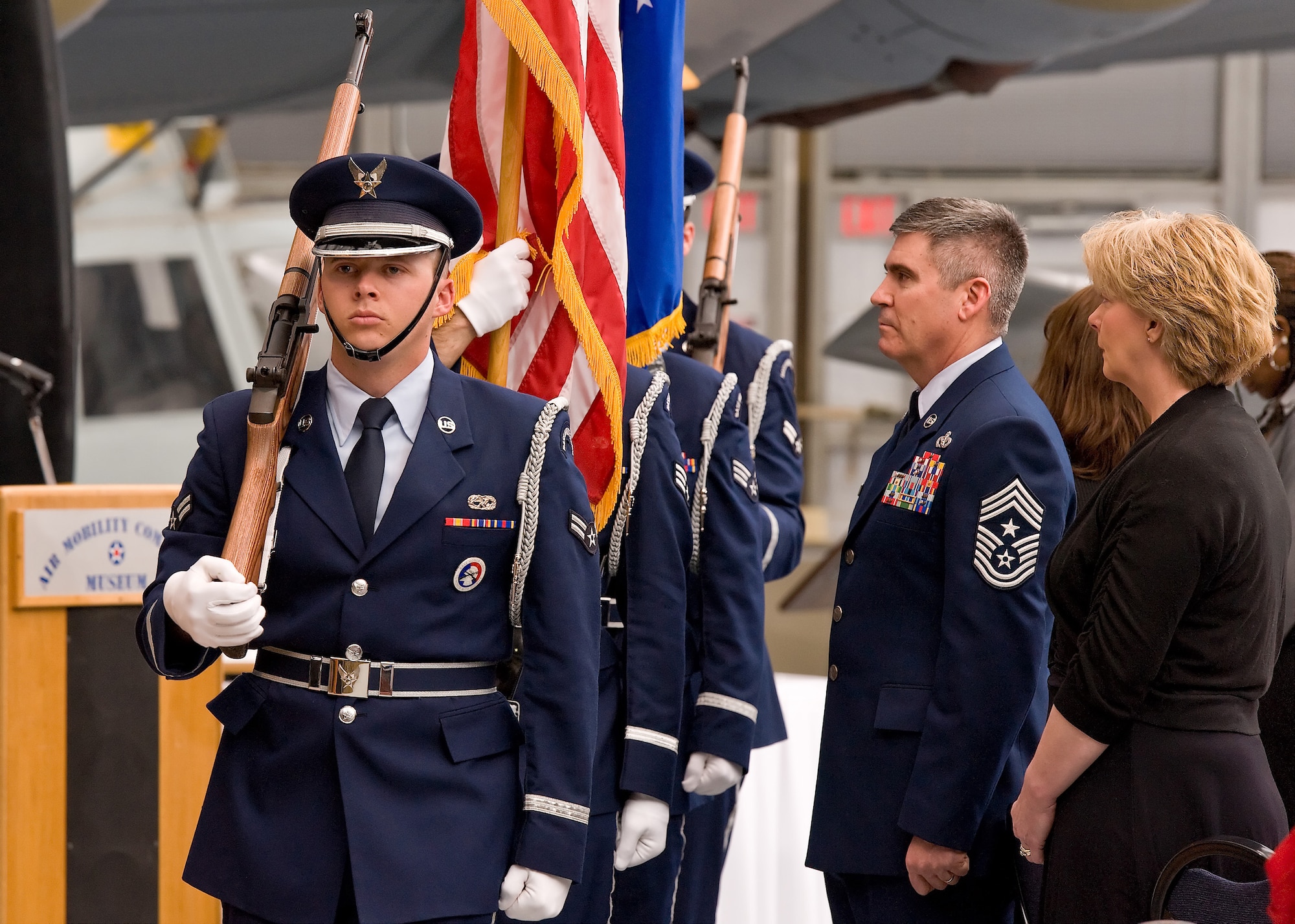 The 436th Airlift Wing Honor Guard posts the colors at the Honorary Commander Induction Ceremony Feb. 4, 2012, at the Dover Air Force Base, Del., Air Mobility Command Museum. The ceremony was held to induct the incoming honorary commanders for 2012. (U.S. Air Force photo by Roland Balik)