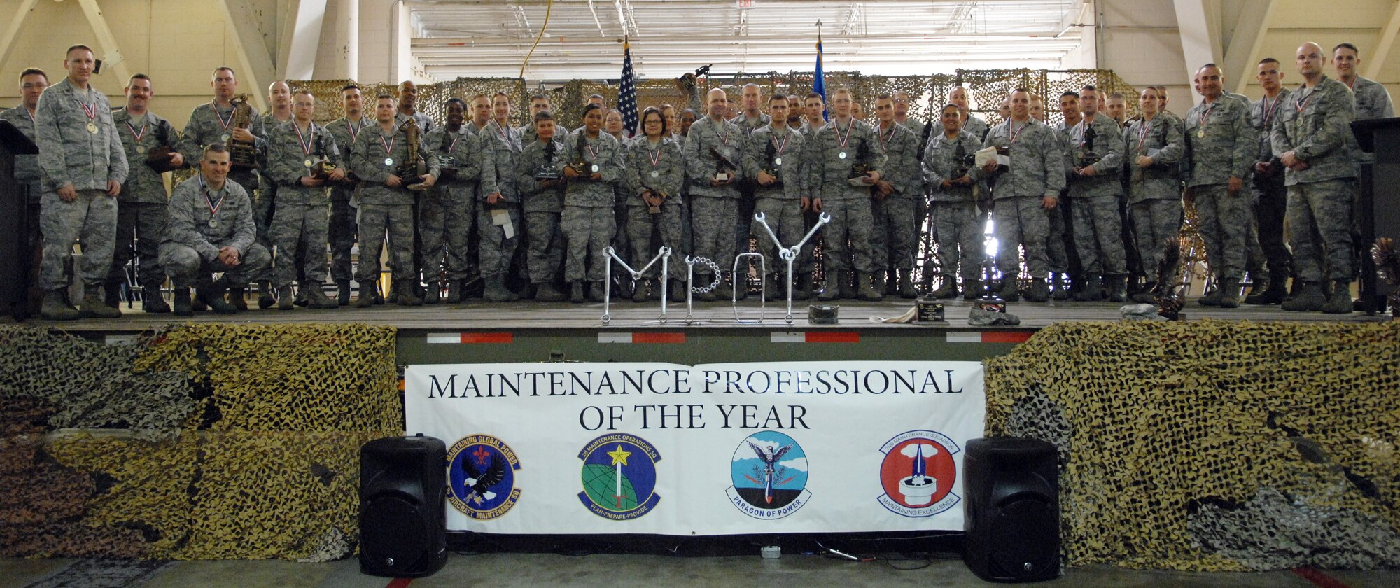 The 2nd Maintenance Group nominees and winners pose for a photo at the Maintenance Professional of the Year banquet on Barksdale Air Force Base, La., Feb. 3. More than 850 Airmen, family and friends attended the event in support of everyone who was nominated. (U.S. Air Force photo/Airman 1st Class Joseph A. Pagán Jr.)(RELEASED)