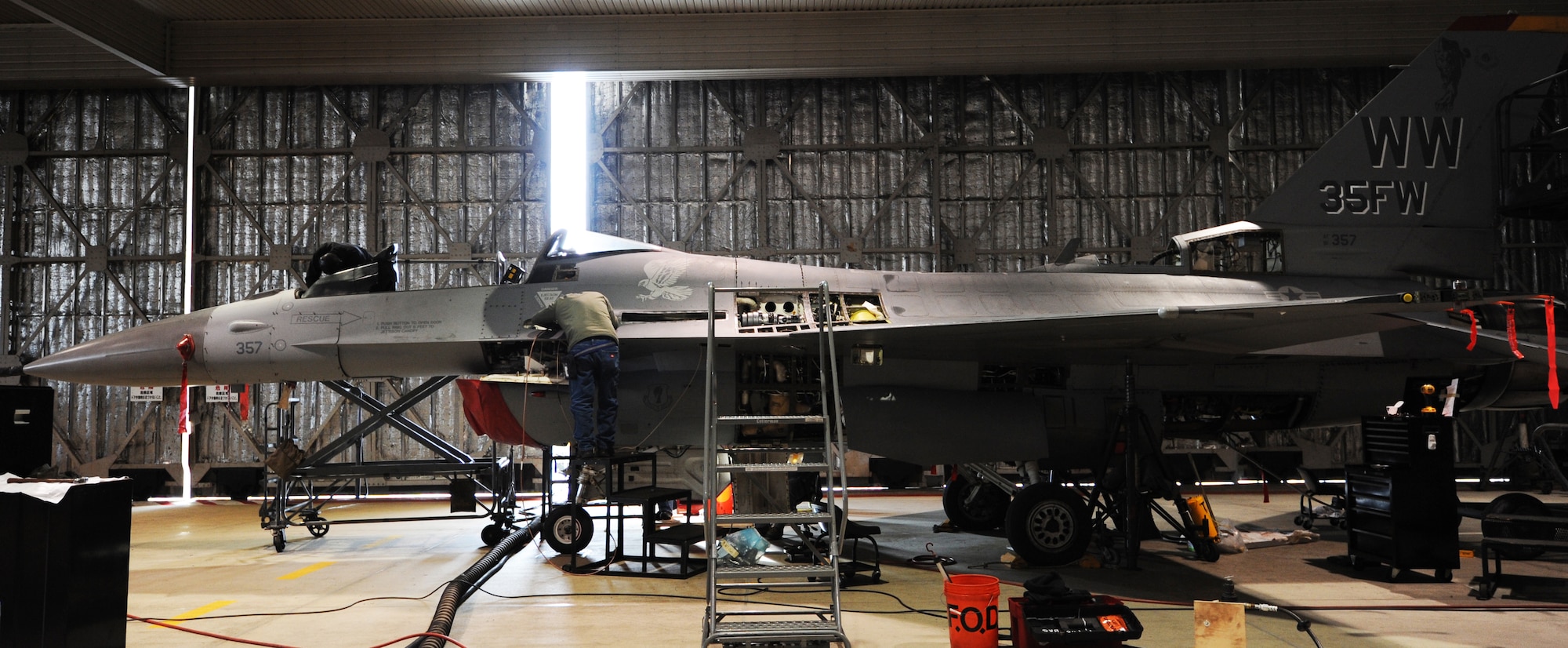 MISAWA AIR BASE, Japan -- An F-16 Fighting Falcon receives upgrades here, Jan. 27. Upgrades to the F-16s include an Onboard Oxygen Generation Systems, Beyond Line of Sight Communications, and Embedded Global Positioning and Inertial Navigation Systems. These systems will improve the lethality of the aircraft. (U.S. Air Force photo/Airman 1st Class Kia Atkins)