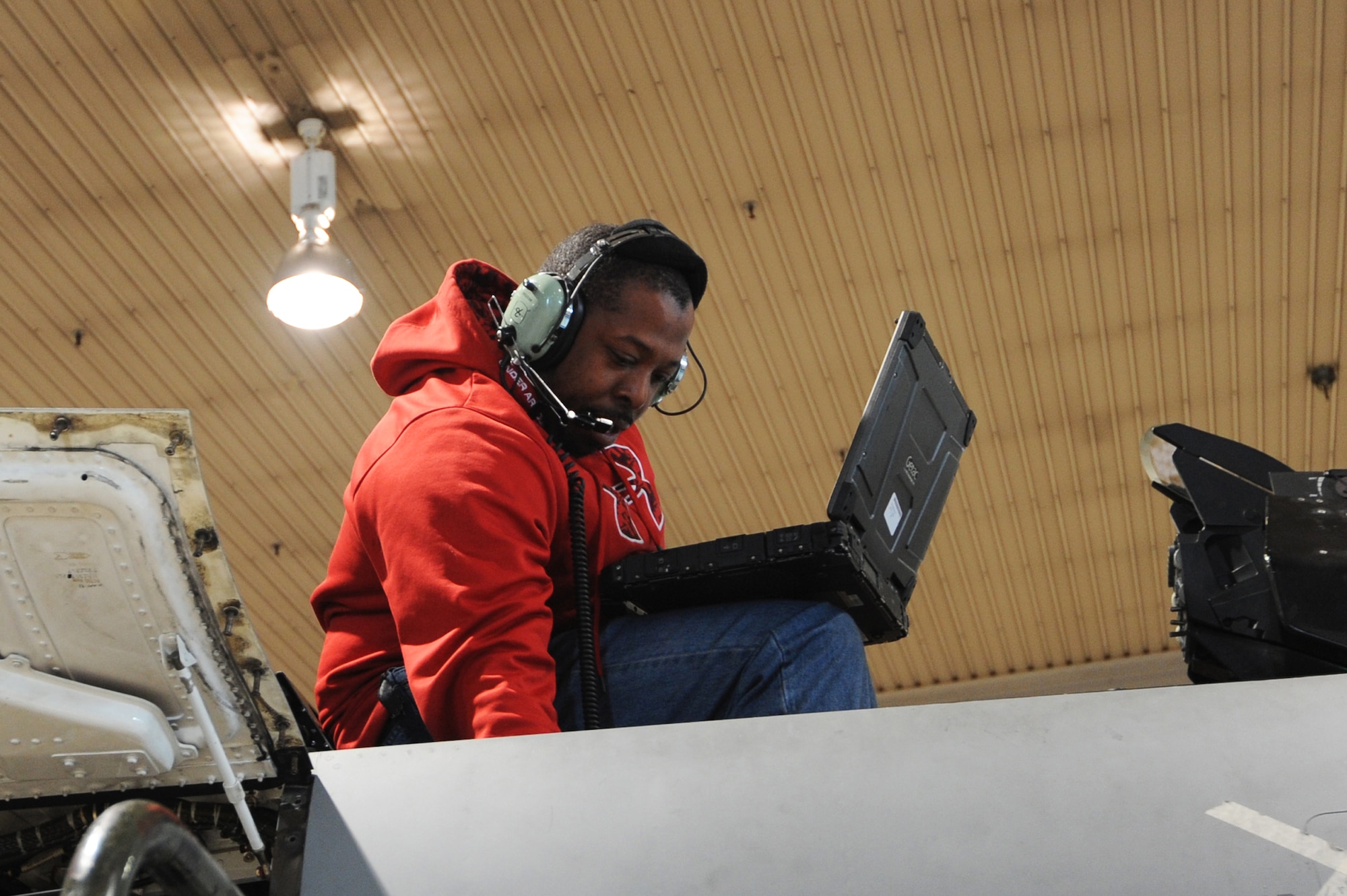 MISAWA AIR BASE, Japan -- Mike Venson, Lockheed Martin avionics technician, checks systems on an F-16 Fighting Falcon after it received upgrades here, Jan. 27. Misawa's F-16s are undergoing several upgrades that will improve their lethality. (U.S. Air Force photo/Airman 1st Class Kia Atkins)