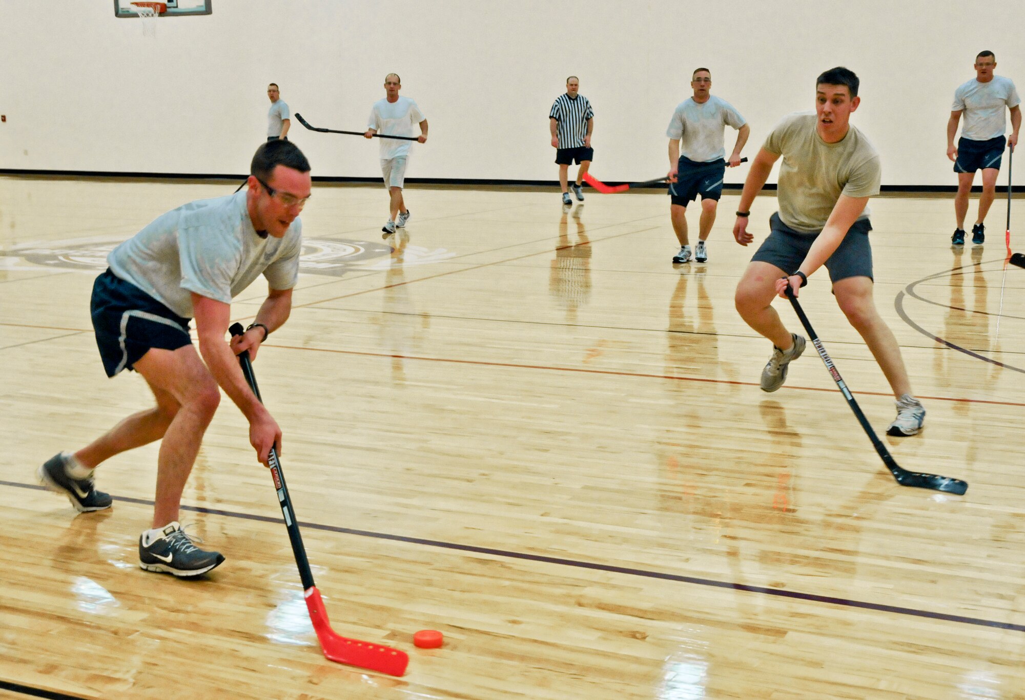 Security Forces, Logistics Readiness and the Communications Squadrons take it to the “ice” in games of floor hockey at the fitness center Minneapolis Air Reserve Station. (Air Force Photo/Tech Sgt. Bob Sommer)
