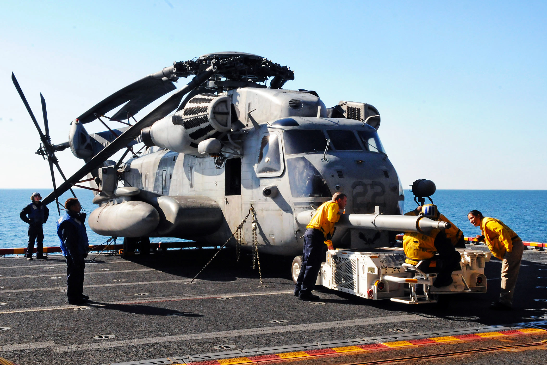 Sailors aboard the multipurpose amphibious assault ship USS Iwo Jima