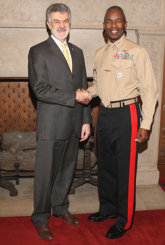Cleveland Mayor Frank G. Jackson greets Maj. Gen. Ronald Bailey, commander of 1st Marine Division, at City Club here Feb. 7. Bailey is the first speaker, kicked off the Marine Week Speaker Series where general officers will be holding timely and diverse topic discussion meetings. The Speaker Series will continue throughout Marine Week June 11-17.