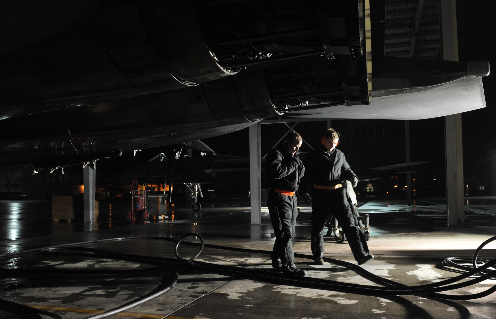 Staff Sgt. Randy Drake and Senior Airman Christopher Murray, 391st Aircraft Maintenance Unit crew chiefs, inspect an F-15E Strike Eagle before performing a hydraulic systems bleed Feb. 1, 2012 at Mountain Home Air Force Base, Idaho. Crew chiefs play an important role in mission success. “Without the crew chiefs the jets aren’t flying; and if the jets aren’t flying, there is no Air Force,” said Drake. (U.S. Air Force photo by Senior Airman Debbie Lockhart/Released)