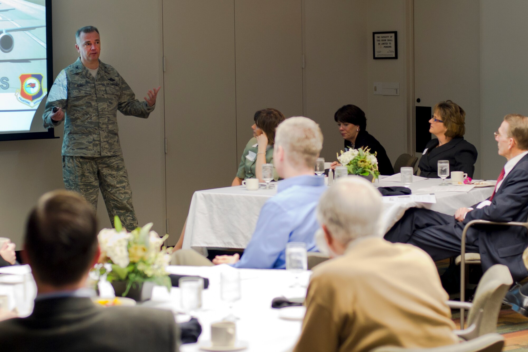 Col. Ricky N. Rupp, 22nd Air Refueling Wing commander, gives local business leaders a mission brief Feb 2, 2012, Wichita, Kan. The Wichita Metro Chamber of Commerce invited Rupp to its meeting in order to help understand the impact the military has on the local community. (U.S. Air F photo by Airman 1st Class Armando A, Schwier-Morales)