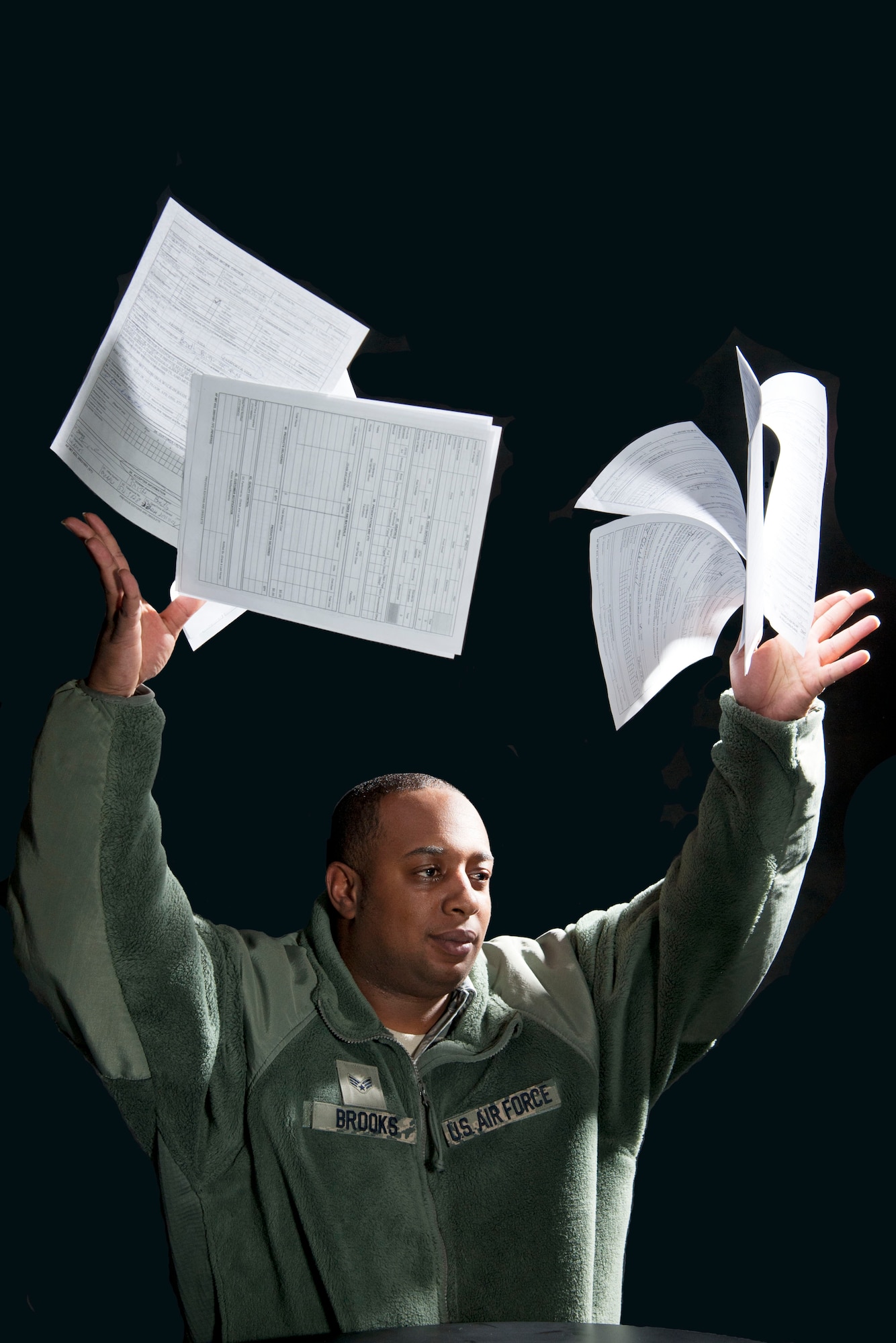 A frustrated Senior Airman Michael Brooks, 49th Logistics Readiness Squadron, gives up his attempt to file his 2011 taxes on his own. Brooks decides to file his taxes at the Holloman Tax Center located at the Community Activities Center on base. (U.S. Air Force Photo illustration by Airman 1st Class Anthony M. Ward)