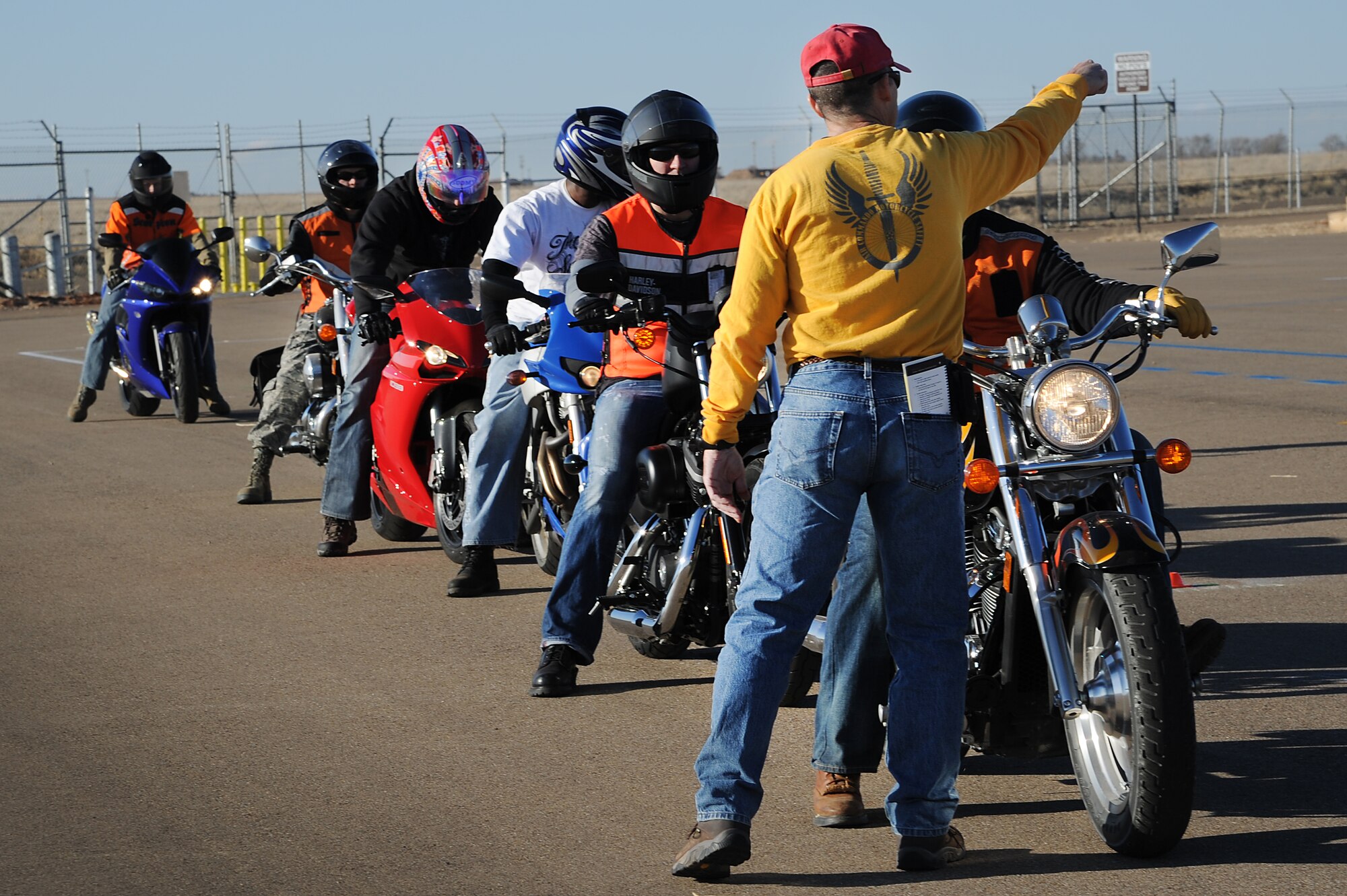U.S. Air Force Senior Master Sgt. Bill Seaman, 27th Special Operations Wing mission enhancement flight superintendant, directs a motorcycle safety class to base personnel at the Landing Zone at Cannon Air Force Base, N.M., Feb. 2, 2012. The safety course training is required by Air Force Instruction for all active duty personnel who ride a motorcycle on or off duty. (U.S. Air Force photo by Airman 1st Class Xavier Lockley)