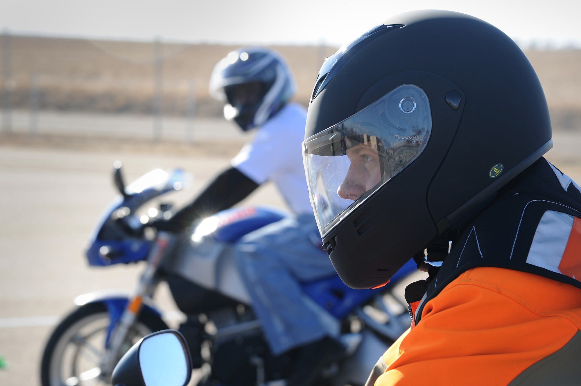 U.S. Air Force Airman 1st Class Jonathon Peeters, 27th Special Operations Aircraft Maintenance Squadron, rides a motorcycle while performing stop-and-go maneuvering near the Landing Zone at Cannon Air Force Base, N.M., Feb. 2, 2012. The safety course training is required by Air Force Instruction for all active duty personnel who ride a motorcycle on or off duty. (U.S. Air Force photo by Airman 1st Class Xavier Lockley) 