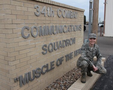 TINKER AIR FORCE BASE, Okla. – Senior Airman Ruth Bryce, a 34th Combat Communications Squadron cyber transport journeyman here, looks forward to her new role as a Tops in Blue team technician Feb. 7. Bryce is one of six technicians selected from 50 candidates to build the team’s stage sets and run the audio, video and lighting for the Tops in Blue show. Although she will miss the 34th CBCS during her one year tour with Tops in Blue, her deployment experience while assigned to combat communications will help ensure the show is set up safely and efficiently. (U.S. Air Force photo by Robert Talenti)
