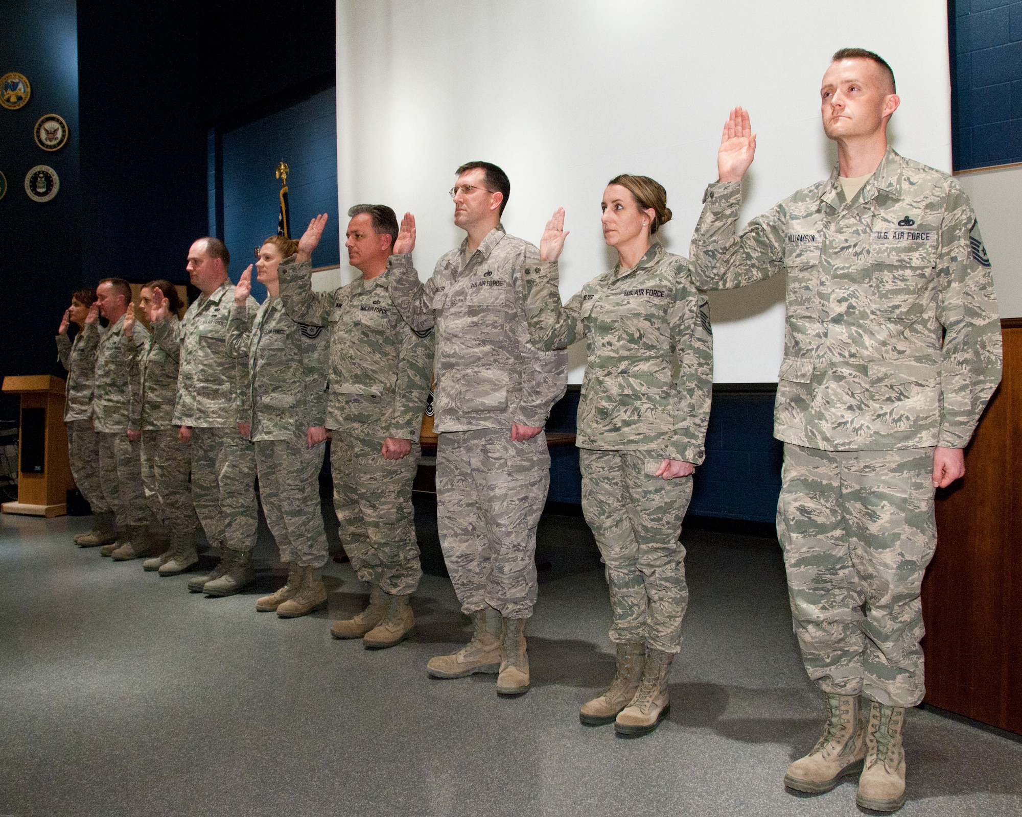 Newly promoted Master Sergeants are sworn in during a NCO recognition ceremony at Minneapolis Air Reserve Station, Minn. The commemoration recognized Airmen who have been promoted to the top tiers of the enlisted ranks, signifying the levels of accomplishment each inductee has achieved in the Air Force. (Air Force Photo/TSgt. Jim Loehr)
