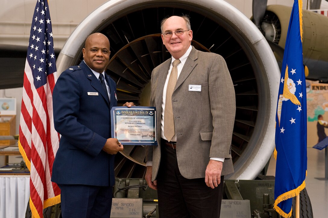 Commanders from the 436th and 512th Airlift Wings, Air Force Mortuary Affairs Operations, and Joint Personal Effects Depot recognize outgoing honorary commanders and induct new local community leaders during the Honorary Commander Induction Ceremony Feb. 4, 2012, at Dover Air Force Base, Del., Air Mobility Command Museum. 2011 honorary commanders were inducted as honorary commanders alumni. Cols. Mark D. Camerer and Randal L Bright administered the honorary commander's oath to incoming 2012 honorary commanders. Dr. Stphanie Steckel, 2011 honorary commander, was the guest speaker for the event. (U.S. Air Force photo/Roland Balik)