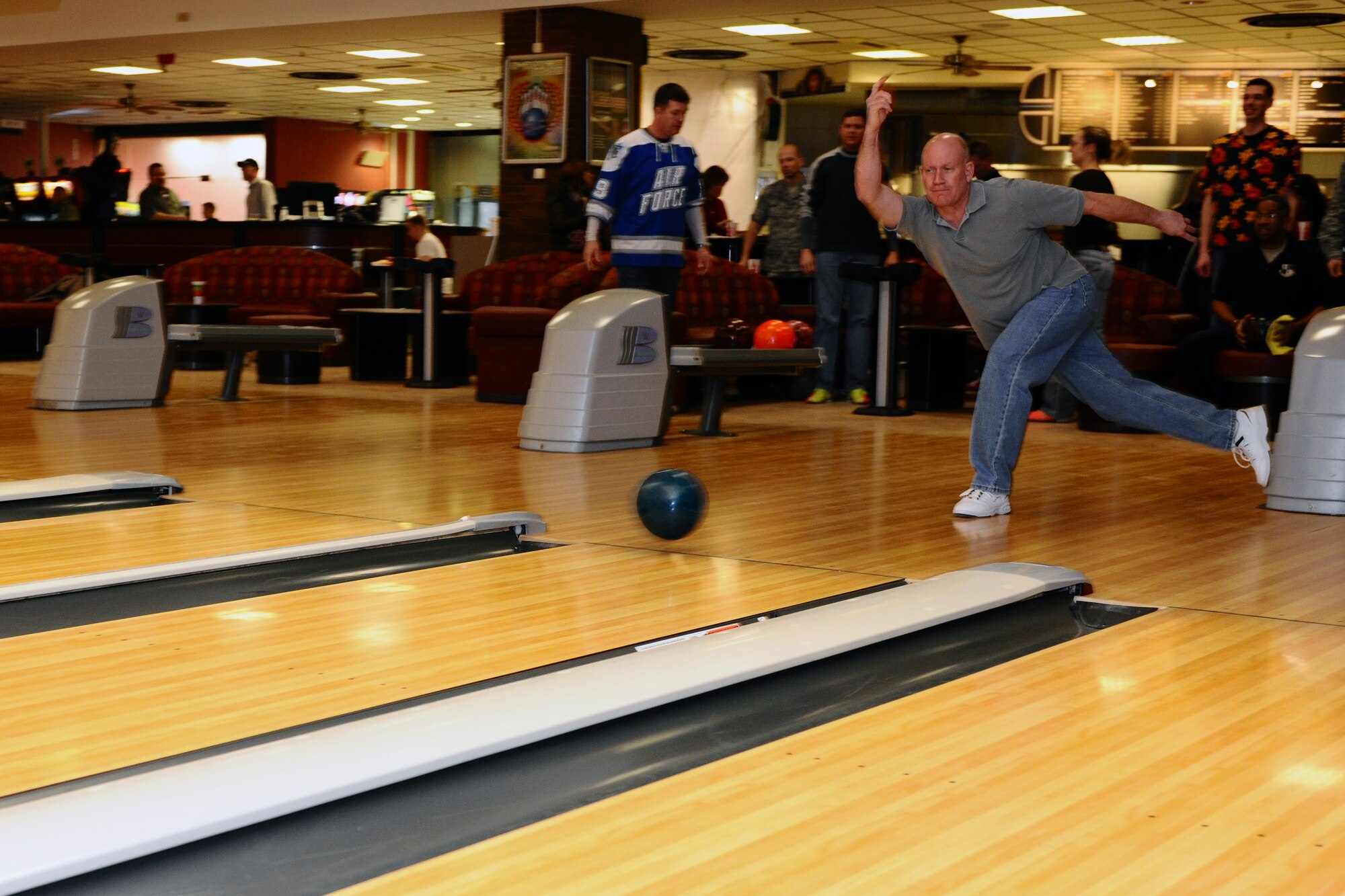 SPANGDAHLEM AIR BASE, Germany – Col. Duane Creamer, 52nd Maintenance Group commander, throws a bowling ball down a lane during the “Commanders vs. Chiefs” bowling tournament inside the Eifel Lanes Bowling Center here Feb. 3. The chiefs surmounted the commanders with a total score of 1491 - 1443. The tournament is designed to help build morale and camaraderie between enlisted and commissioned leaders. (U.S. Air Force photo by Airman 1st Class Dillon Davis/Released)