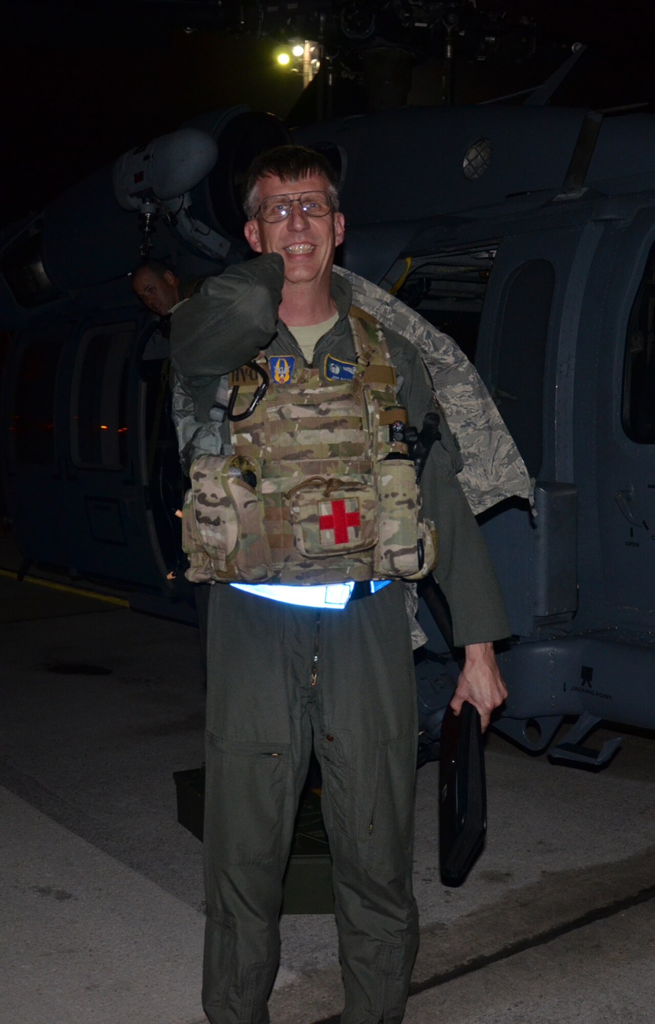 Col. Jeff Macrander, 920th Rescue Wing commander, Patrick Air Force Base, Fla., halted his crew's combat rescue training when they were called to help accident victims. Three people were injured in an airboat crash and needed life-saving medical treatment. Pilotig two HH-60G Pave Hawk helicopters, Macrander and his crews picked the people up and took them to a nearby hospital. (U.S. Air Force photo/Capt. Cathleen Snow)
