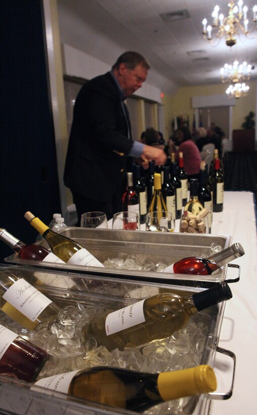 An assortment of wines were chilled before being served to participants during the Wine Tasting event held at the Paradise Point Officers’ Club aboard Marine Corps Base Camp Lejeune, recently. The owners of Edward and Sophie Rollat winery brought six different types of wine that offered a flavorful variety to taste buds.