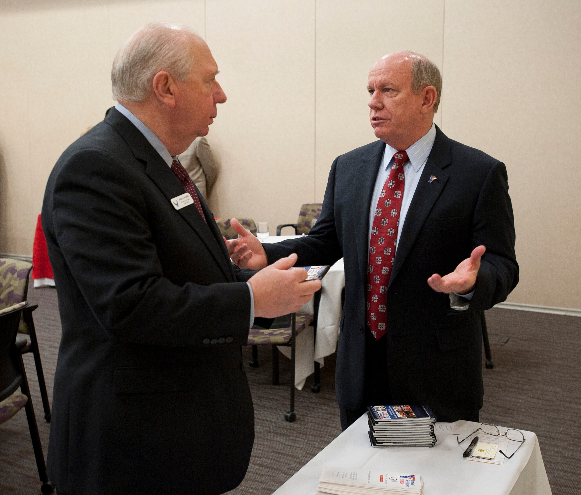 Al Cornella (left), from South Dakota, speaks with retired Brig. Gen. Thomas 
Landermeyer, of the Armed Services YMCA, during an Air Force civic leader 
conference at Joint Base Andrews, Md., Jan. 31, 2012. (U.S. Air Force 
photo/Jim Varhegyi)