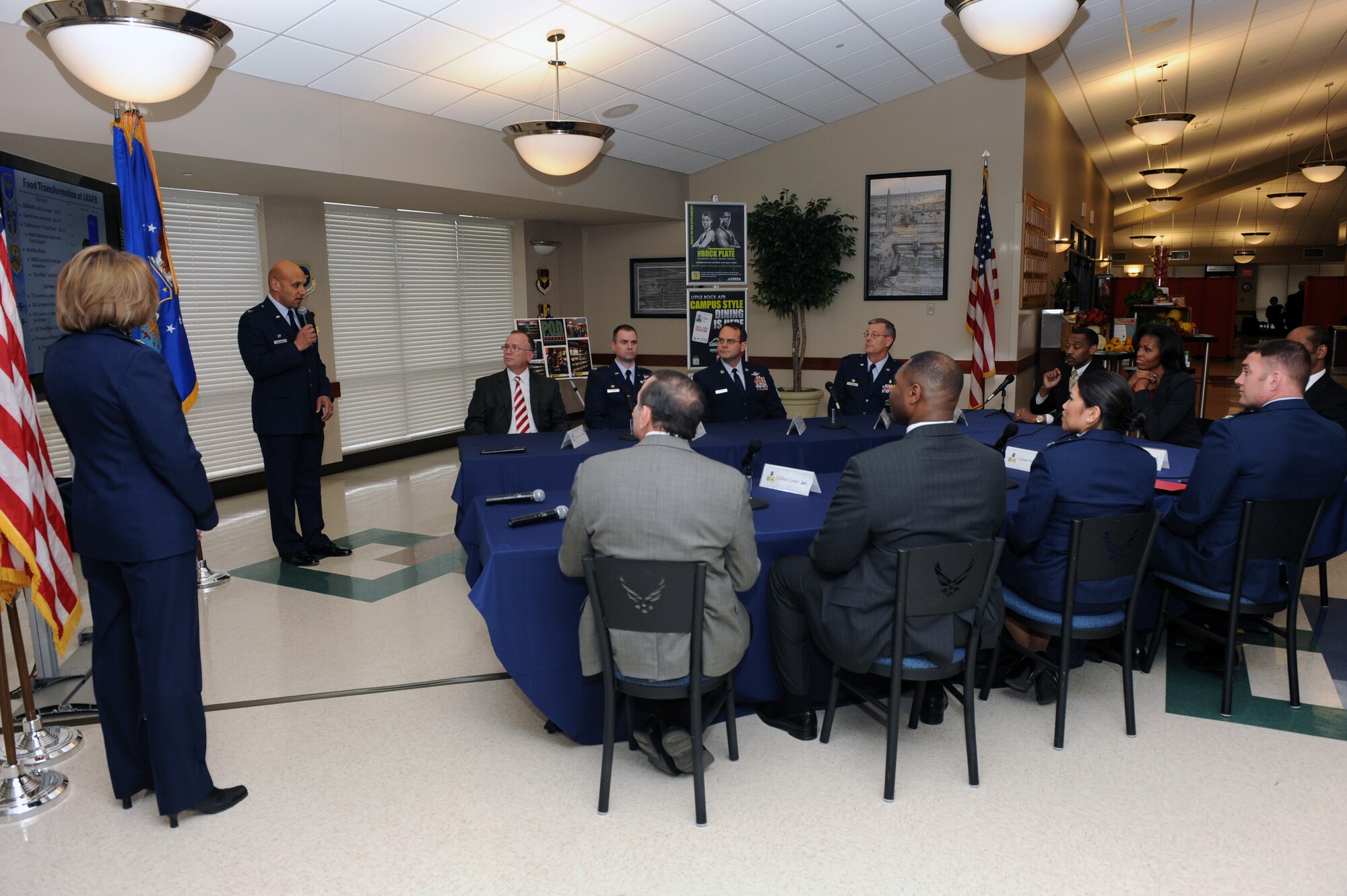 First Lady Michelle Obama receives a briefing about the food transformation initiative pilot program, from Col. Brian Robinson, 19th Airlift Wing commander Feb. 9, 2012, at Little Rock Air Force Base, Ark. The First Lady visited the base to make an announcement about the military’s efforts to improve the nutrition of food served throughout military bases. (U.S. Air Force Photo by Airman 1st Class Rusty Frank)