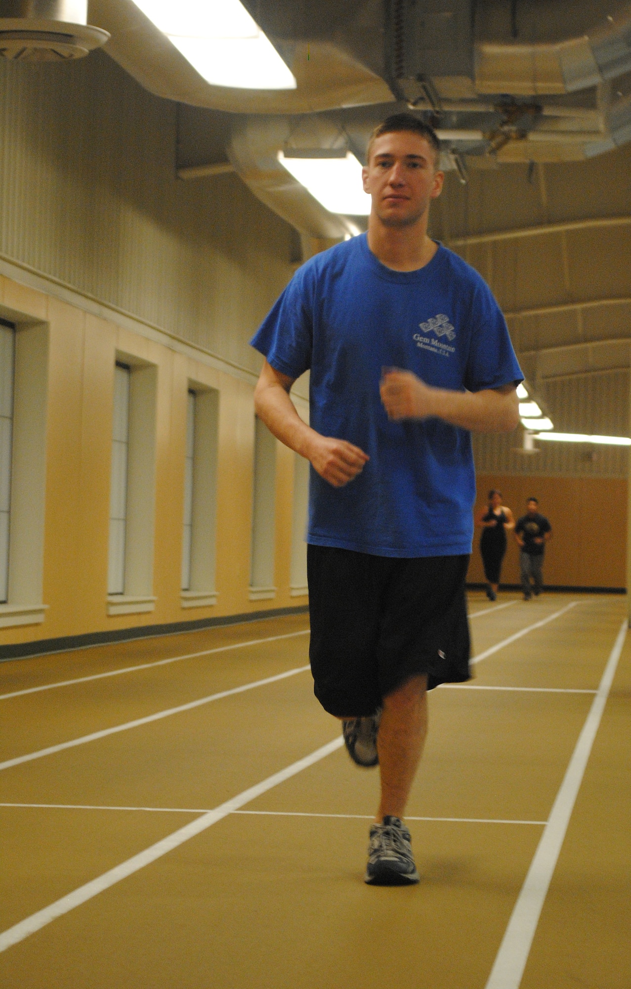 Airman Rory Stodgell, 341st Logistics Readiness Squadron traffic management apprentice, earns five points in the monthly fitness challenge by running a lap on the track at the Fitness Center on Feb. 6. Anyone interested in participating in the challenge can do so by visiting the front desk of the center. (U.S. Air Force photo/Airman 1st Class Katrina Heikkinen)