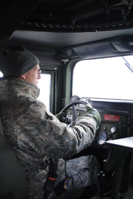 Col. Robert Mendenhall, 341st Security Forces Group commander, operates a Humvee on the ski system for the first time Feb. 2. (U.S. Air Force photo/Airman 1st Class Cortney Paxton)
