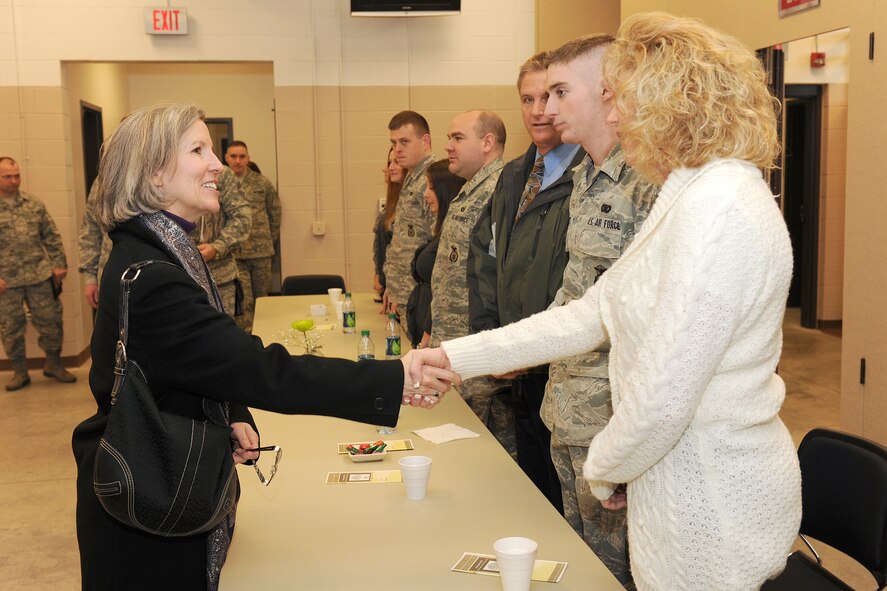 Mrs. Kathy Hostage (left) talks with 174th Fighter Wing Security Forces members and their families during a visit to Hancock Field Air National Guard Base, Syracuse, NY on February 9, 2012. Mrs. Hostage is the wife of Air Combat Commander General Michael Hostage.