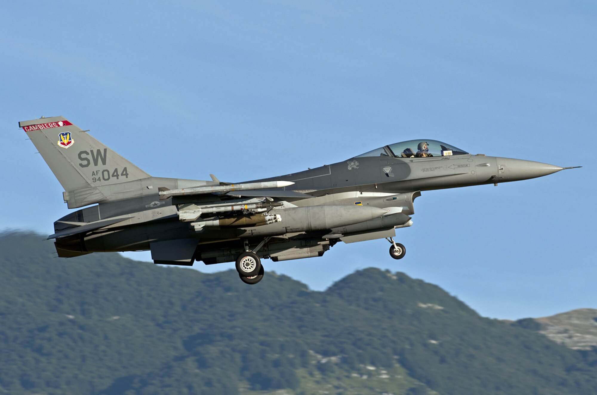 U.S. Air Force Capt. Jason Blodzinski, 77th Fighter Squadron F-16 Fighting Falcon pilot, lands at Aviano Air Base, Italy, following an Operation Unified Protector sortie. The 77th FS deployed to OUP to support NATO forces through the suppression and destruction of enemy air defenses and ensured the safety of NATO assets.  (U.S. Air Force courtesy photo/released)