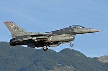 U.S. Air Force Capt. Jason Blodzinski, 77th Fighter Squadron F-16 Fighting Falcon pilot, lands at Aviano Air Base, Italy, following an Operation Unified Protector sortie. The 77th FS deployed to OUP to support NATO forces through the suppression and destruction of enemy air defenses and ensured the safety of NATO assets.  (U.S. Air Force courtesy photo/released)