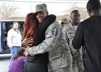 Master Sgt. Adolphus Grisby is welcomed back to Seymour Johnson by friends and family on Feb. 8, 2011. The 916th Air Refueling Wing will host a number of returning deployers this month. (USAF photo by MSgt. Wendy Lopedote, 916ARW/PA)