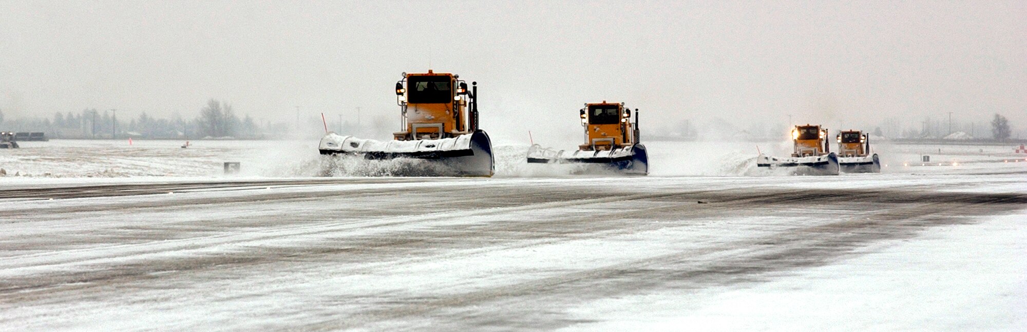92nd Civil Engineer Squadron snow crews remove snow from Fairchild’s Runway Jan. 3. The squadron was named the Balchen-Post Award winners for the 2010-2011 winter, an honor bestowed on them for the sixth time. (Courtesy photo)