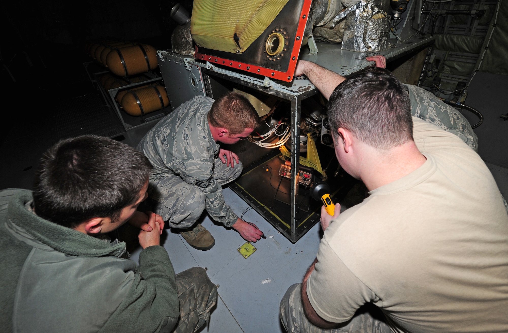 Tech. Sgt. Chris Anderson, 373rd Training Squadron, instructs students how to check for resistance on a bondage strip on a KC-135 Stratotanker, during an auxiliary power unit craftsman course at Fairchild Jan. 25. Each engine is capable of producing more than 21,000 pounds of thrust and can propel the Stratotanker to more than 500 mph. (U.S. Air Force photos by Airman 1st Class Taylor Curry) 