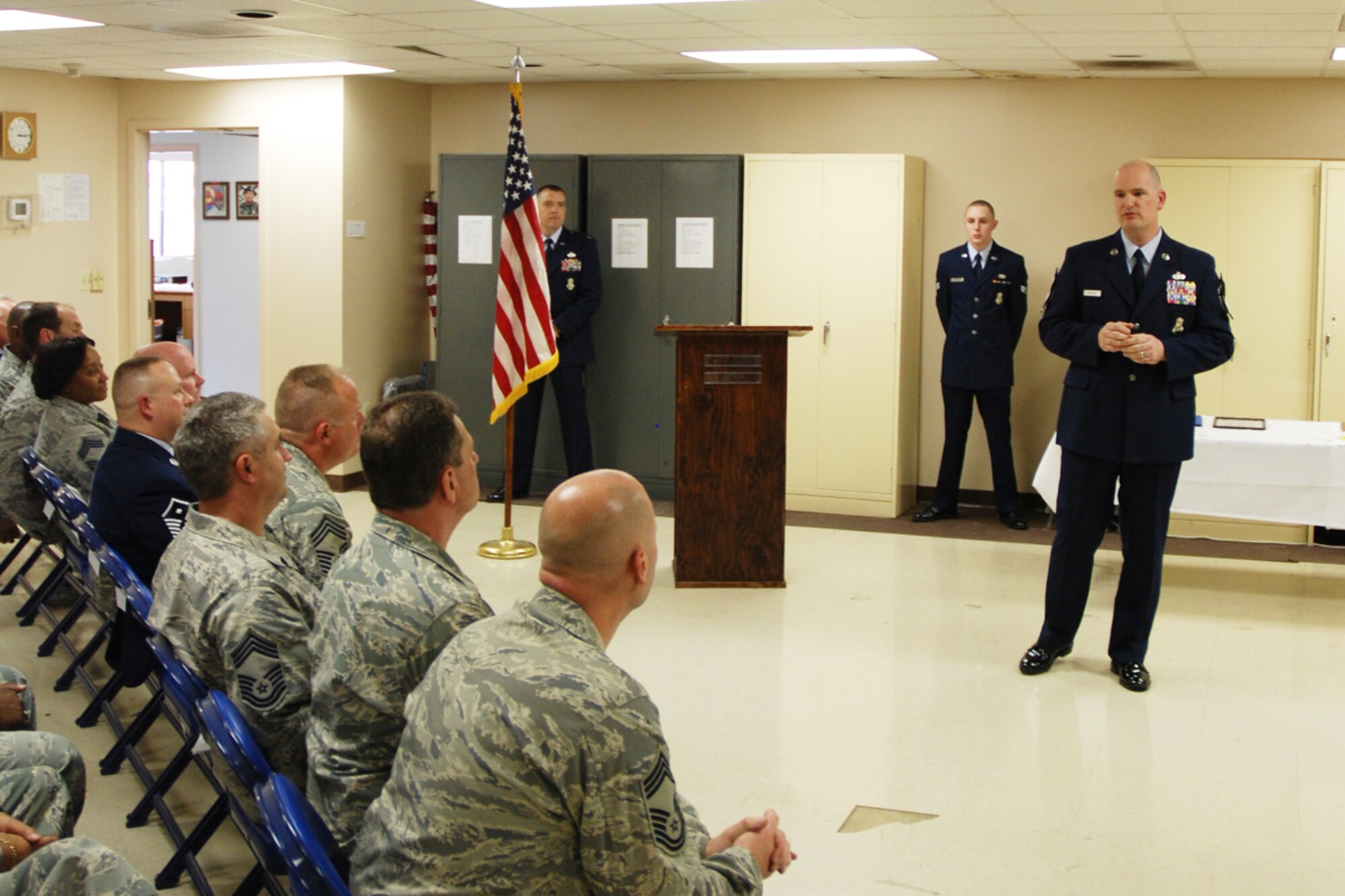 Chief Master Sgt. DeMaine Milbach, 94 SFS manager, addresses attendees during his promotion and pin-on ceremony Feb. 4, at the base firing range. Milbach is succeeding Chief Master Sgt. Wendell Peacock, former 94 SFS manager and current 94th Airlift Wing Command Chief Master Sgt. (U.S. Air Force photo/Senior Airman Spencer Gallien)