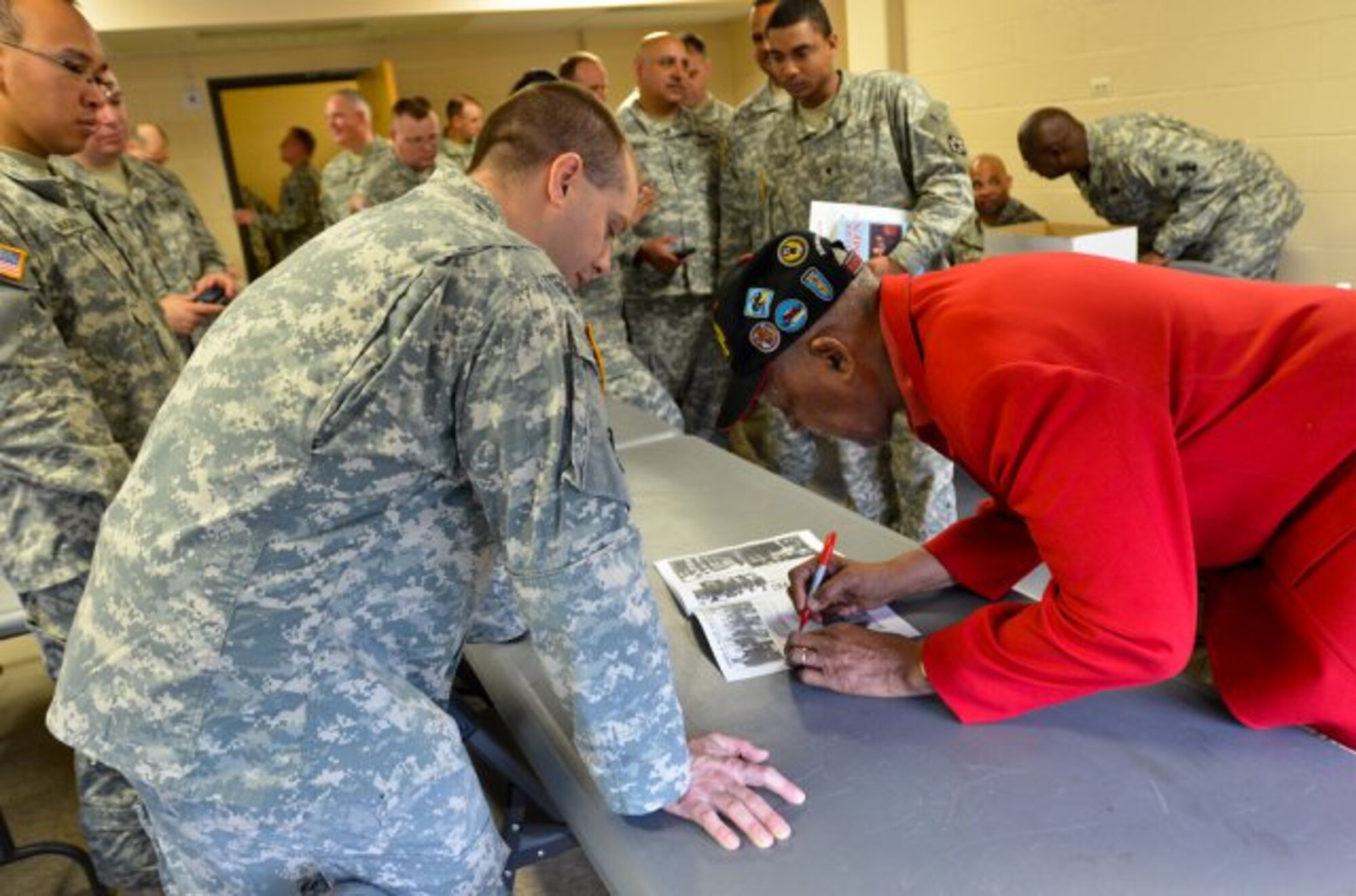 Retired Tech. Sgt. George Watson Sr., a 91-year-old veteran who served in the African-American fighter group during World War II, shared his experiences and life lessons with the 411th Engineer Brigade Soldiers, who are preparing for deployment in support of Operation Enduring Freedom at Joint Base McGuire-Dix-Lakehurst, N.J., on Jan. 27, 2012. (U.S. Army courtesy photo/Released)